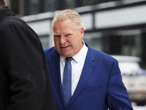 Ontario Premier Doug Ford leaves following a meeting on health care with Prime Minister Justin Trudeau and Canada's premiers in Ottawa on Tuesday, Feb. 7, 2023 in Ottawa.