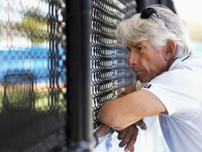 Toronto Blue Jays television analyst Buck Martinez watches a bull pen pitching session during baseball spring training in Dunedin, Fla., Monday, Feb. 20, 2023.