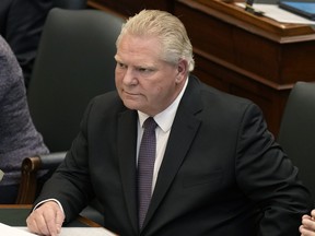 Ontario Premier Doug Ford looks on as the legislature resumes at Queen's Park in Toronto on Tuesday, Feb.21, 2023.