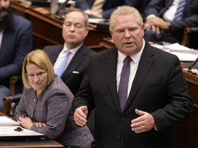 Ontario Premier Doug Ford answers a question on health care as the legislature resumes at Queen's Park in Toronto on Tuesday, Feb.21, 2023.