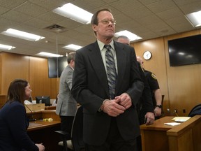 Mark Jensen is led out of the courtroom in handcuffs after a guilty verdict in his trial at the Kenosha County Courthouse on Wednesday, Feb. 1, 2023, in Kenosha, Wis.