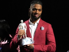 Buffalo Bills safety Damar Hamlin accepts the Alan Page Community Award during the NFLPA press conference at the Phoenix Convention Center in Phoenix, Ariz., Feb. 8, 2023.