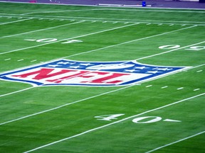 Details of the field during a Super Bowl LVII stadium and field preparation press conference.