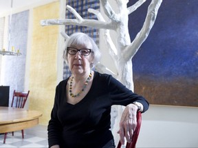 Artist Gathie Falk poses with some of her work at her home in Vancouver, B.C. in this Postmedia file photo.