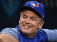 Former John Gibbons manager of the Toronto Blue Jays in 2018, looks on from the dugout as he waits for a game to begin agains the Kansas City Royals at Kauffman Stadium in Kansas City, Missouri. (Photo by Ed Zurga/Getty Images)