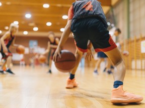 A 23-year-old girls junior varsity assistant basketball coach reportedly pretended to be a 13-year-old player in a Jan. 21 game in Virginia and has been fired, along with the head coach.