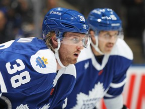 Rasmus Sandin of the Toronto Maple Leafs waits for play to resume against the San Jose Sharks during an NHL game at Scotiabank Arena on November 30, 2022 in Toronto, Ontario, Canada.