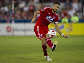 Matt Hedges of FC Dallas clears the ball against Aston Villa during an international friendly on July 23, 2014 at Toyota Stadium in Frisco, Texas.