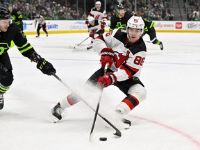 New Jersey Devils center Jack Hughes (86) skates against the Dallas Stars during the third period at the American Airlines Center Jan 27, 2023.