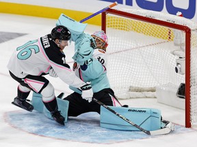 Atlantic Division forward Mitchell Marner of the Toronto Maple Leafs shoots the puck against Metropolitan Division goaltender Ilya Sorokin of the New York Islanders during the second period of a semifinal game during the 2023 NHL All-Star Game at FLA Live Arena.