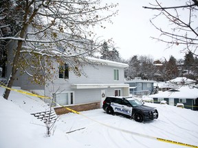 Police tape surrounds the residence where four University of Idaho students were killed in Moscow, Idaho, November 30, 2022.