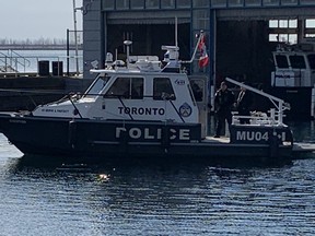 A Toronto Police Marine Unit boat is pictured in the Toronto harbour on Monday, Feb. 6, 2023.