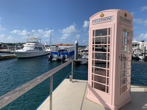 A pink British phone booth on the grounds of the Hamilton Princess and Beach Club in Hamilton, Bermuda. (Jane Stevenson/Toronto Sun)