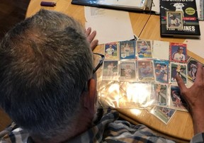 Steve Whitzman, with some of his more than 31,000 Montreal Expos trading cards.