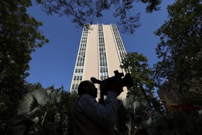 'APPEARANCE OF A REPRISAL': Indian officials probe BBC for third day, alleging tax dodge A cameraman works outside a building having BBC offices, where income tax officials are conducting a search, in New Delhi, India, February 14, 2023. REUTERS/Anushree Fadnavis