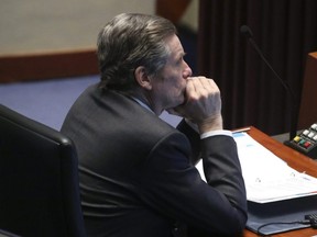 Toronto Mayor John Tory listens to city council as they start to debate the budget at city hall Wednesday, Feb. 15, 2023.