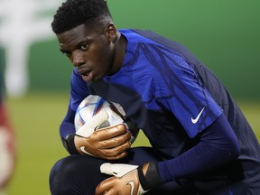 Goalkeeper Sean Johnson of the United States participates in an official training on the eve of the group B World Cup soccer match between United States and Wales, at Al-Gharafa SC Stadium, in Doha, Qatar, Sunday, Nov. 20, 2022.