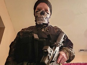 An individual resembling and believed by the FBI to be suspect Sarah Clendaniel from Maryland, holding a rifle and clad in tactical gear, is seen in this undated image, released on February 6, 2023.