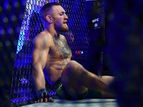Jul 10, 2021; Las Vegas, Nevada, USA; Conor McGregor reacts following an injury suffered against Dustin Poirier during UFC 264 at T-Mobile Arena.