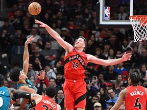 Toronto Raptors centre Jakob Poeltl (19) blocks a shot from Detroit Pistons guard Killian Hayes (7) in the first half at Scotiabank Arena.