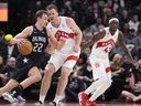 Orlando Magic forward Franz Wagner (22) drives to the net against Toronto Raptors centre Jakob Poeltl (19) during the second half at Scotiabank Arena.