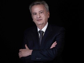 Lebanon's Central Bank Governor Riad Salameh poses during a studio photo session in the capital Beirut, on Dec. 20, 2021.
