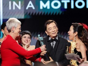 Jenny Slate, Tallie Medel, Jamie Lee Curtis, James Hong and Michelle Yeoh accept the Outstanding Performance by a Cast in a Motion Picture award for "Everything Everywhere All at Once" during the 29th Screen Actors Guild Awards at the Fairmont Century Plaza Hotel in Los Angeles, Sunday, Feb. 26, 2023.
