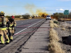 A portion of the main freeway that runs through the southern Arizona desert and links the state's two largest cities remains closed outside Tucson on Wednesday morning, a day after a deadly crash caused a hazardous material leak and forced evacuations nearby.