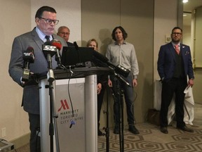 The family of Matthew Staikos has offered up a $250,000 reward for information leading to the arrest of the gunman who murdered him. Pictured from left to right at a Feb. 7, 2023 press conference are: Retired Toronto homicide officer Dave Perry, now a private investigator CEO with ISN Inc. (Investigative Solutions Network), and Matthew Staikos’ dad, Nick, mom Gale and brother George. (Jack Boland/Toronto Sun)