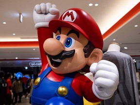 A doll of Nintendo game character Mario is displayed at a Nintendo store in Tokyo on November 5, 2020, after the gaming giant said its first-half net profit soared 243.6 percent on-year. (BEHROUZ MEHRI/AFP via Getty Images)