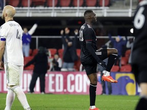 D.C. United forward Christian Benteke (20) reacts after scoring a goal against Toronto FC during the second half at Audi Field.