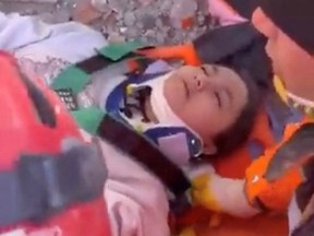 Teen girl rescued from rubble in Turkey 10 days after quake A teenage girl is pulled alive from the rubble by emergency services more than 10 days after an earthquake that has killed more than 42,000 people in the country and neighboring Syria, in Kahramanmaras province, Turkey, Feb. 16,2023, in this still image taken from a video posted on social media.