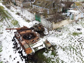 A destroyed Russian tank rusts near the village of Posad-Pokrovske, northwest of the city of Kherson, Ukraine January 31, 2023.