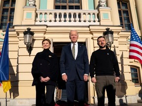 U.S. President Joe Biden poses with Ukrainian President Volodymyr Zelenskiy and Olena Zelenska at Mariinsky Palace on an unannounced visit, in Kyiv, Ukraine, February 20, 2023.