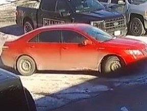 WITNESS SOUGHT: They were driving this red Toyota Camry. HANDOUT/ HAMILTON POLICE