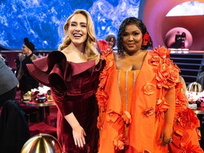 Adele and Lizzo seen during the 65th Grammy Awards.
