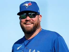 Toronto Blue Jays manager John Schneider participates in spring workouts at the Blue Jays Player Development Complex.