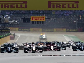 FILE - Drivers start the British Formula One Grand Prix, at the Silverstone circuit, in Silverstone, England, on July 18, 2021. Formula One took a step closer to expanding the grid when governing body the FIA launched its application process for prospective new teams on Thursday.