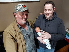 Baby Brooklyn Anne Jackson was born on Feb. 10 and shares the same birthday as her grandpa Dave Jackson, left, and dad Josh Jackson. (Ellwood Shreve/Chatham Daily News)