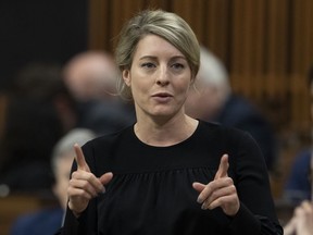 Foreign Affairs Minister Mélanie Joly rises during Question Period, Jan. 31, 2023 in Ottawa. Canada is imposing more sanctions against Iran for gross violations of human rights.