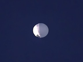 A high altitude balloon floats over Billings, Mont., Wednesday, Feb. 1, 2023.