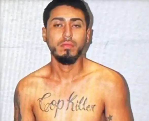 Man with 'cop killer' tattoo arrested for firing at cops | Toronto Sun