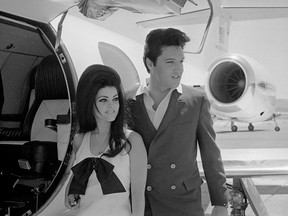 Elvis and Priscilla Presley Posing near Private Jet - Las Vegas - Getty