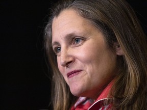 Minister of Finance and Deputy Prime Minister Chrystia Freeland speaks to the media in Hamilton, Ont., during the second day of meetings at the Liberal Cabinet retreat, Jan. 24, 2023.