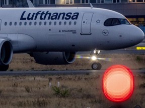 A Lufthansa aircraft rolls to the parking position at the airport in Frankfurt, Germany, Thursday, Sept. 1, 2022.
