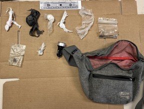 Officers interrupted a suspected auto theft and arrested two people -- seizing tools, key fobs, programming equipment consistent with stealing motor vehicles, a handgun, ammunition, fentanyl, cocaine, and crack cocaine -- in Etobicoke on Tuesday, Feb. 21, 2023.