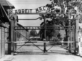 The main gate of the Nazi concentration camp Auschwitz in Poland.  Writing over the gate reads: "Arbeit macht frei" (Work Sets You Free).