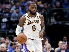 Los Angeles Lakers forward LeBron James controls the ball during the second half against the Dallas Mavericks at American Airlines Center in Dallas, Texas, Feb. 26, 2023.