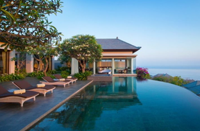Hilton’s LXR Hotels & Resorts sits above tranquil Melasti Beach in Bali. Photographer: Ary Bestari