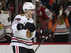 Chicago Blackhawks right wing Patrick Kane celebrates a hat trick against the Toronto Maple Leafs on Sunday, Feb. 19, 2023, in Chicago.